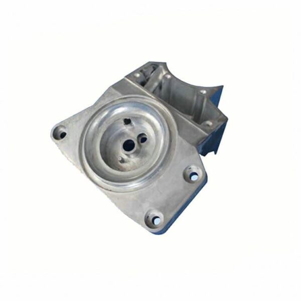 Machined metal part with a circular recess, several holes, and four mounts on a white background.