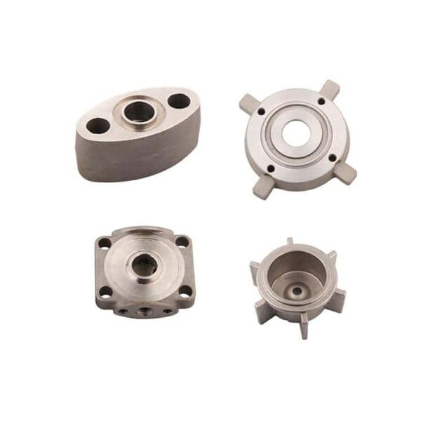 Four metal machine parts with unique shapes and hole patterns on a white background.
