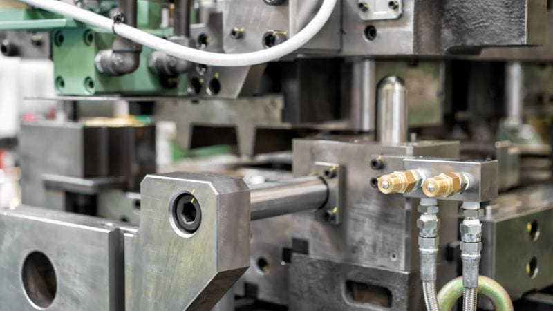 a tool steel die mounted on a die casting machine