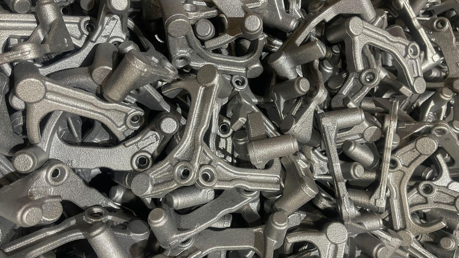 a large volume Die Casting Components, exemplifying the common practice of large volume die casting production