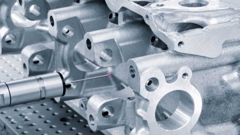 precision die casting parts being inspected